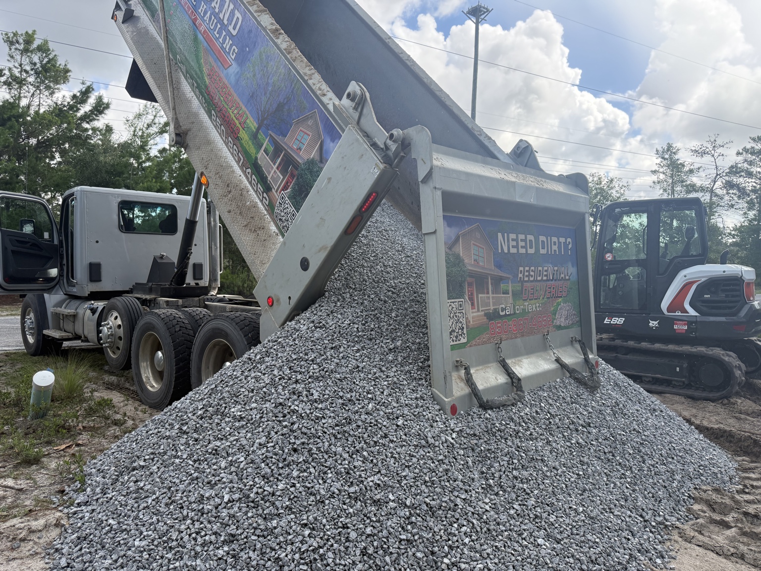 #57 stone being delivered for driveway gravel