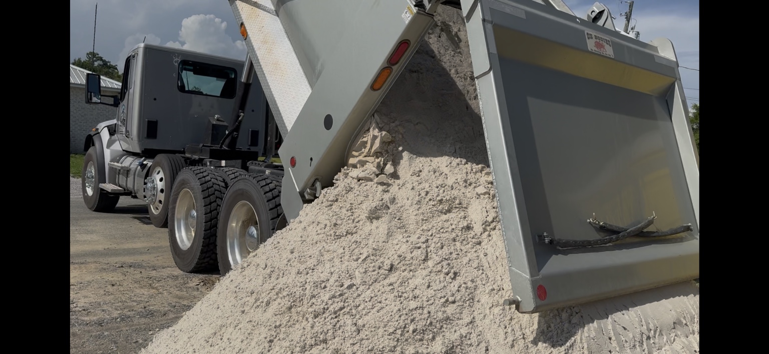 Sand being delivered from dump truck